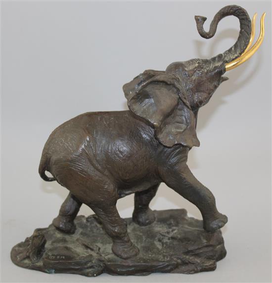 A 20th century patinated bronze elephant, 9.5in.